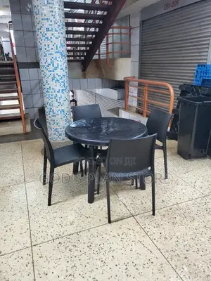 Mistrial Plastic Dining Table and Chairs for Unique Bar and Garden