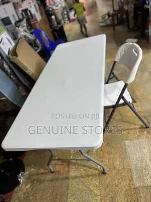 Adjustable Folding Table of the Biggest Size With an Adjustable Chair.