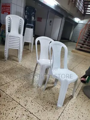 Armless Stackable White Plastic Chairs