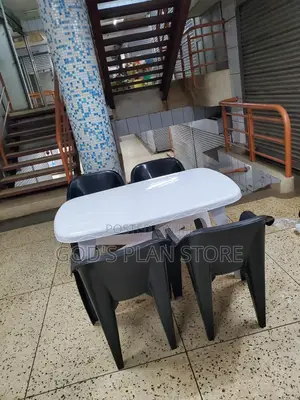 White Rectangular Table and Chairs