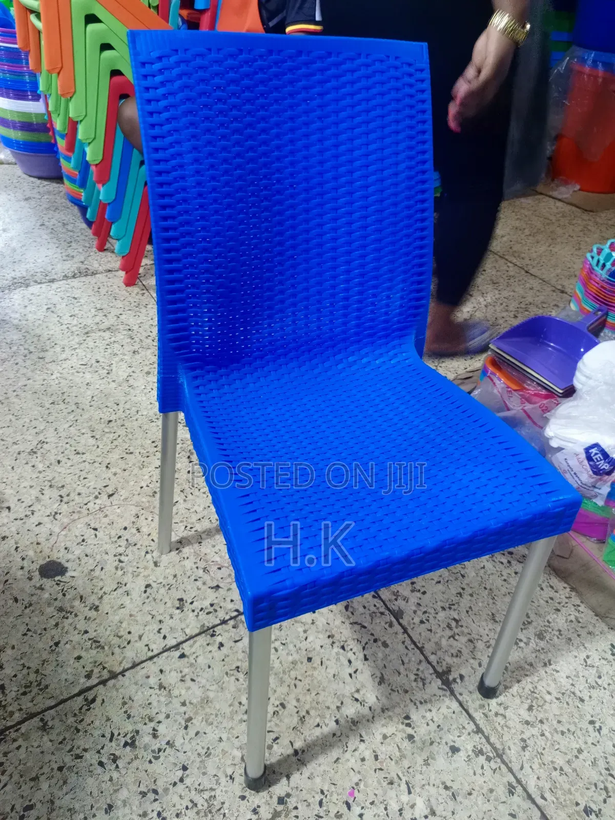 Plastic Chair With Metallic Legs.
