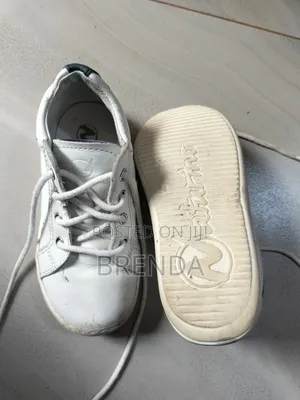 Used Size 24 White Naturino Shoe