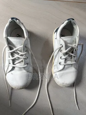 Used Size 24 White Naturino Shoe