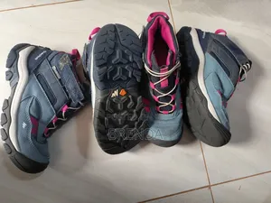 Used Size 30 and 31 Waterproof Quechua Shoes