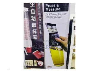 Press and Measure Oil and Vinegar Dispenser