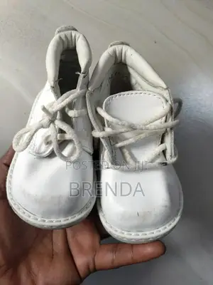 Used Size 21 White Cosmos Shoes