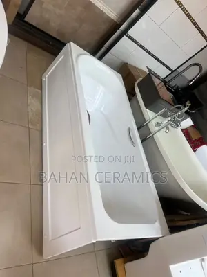 Bathtub With Pannel and Handles.