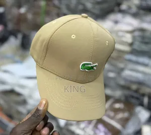 Cream Lacoste Caps