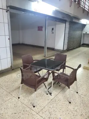 Noble Dining Plastic Chairs and Glass Table Set.