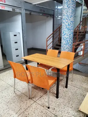 Orange Plastic Chairs and Table With Metallic Legs Foldable