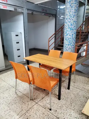 Orange Plastic Chairs and Table With Metallic Legs Foldable