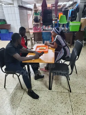 Foldable Table With Black Chairs