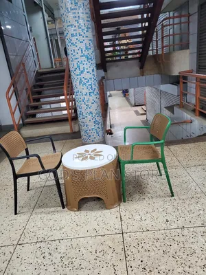 Plastic Table and 2 Accent Chairs