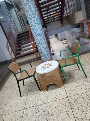 Plastic Table and 2 Accent Chairs
