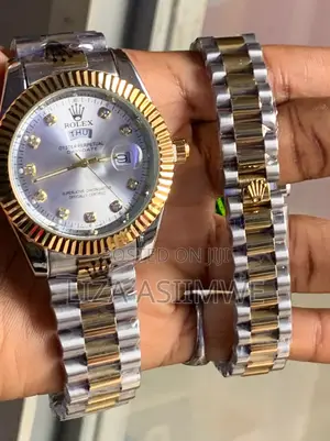 Couple Day-Date Rolex Watches