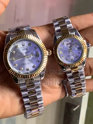 Couple Day-Date Rolex Watches