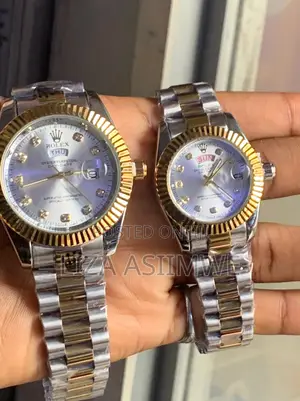 Couple Day-Date Rolex Watches