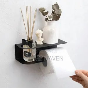 Wall Mounted Toilet Paper Holder With an Integrated Shelf