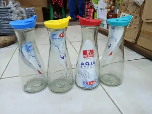Bon Appetit Glass Water Bottle or Jug With a Yellow Plastic Lid