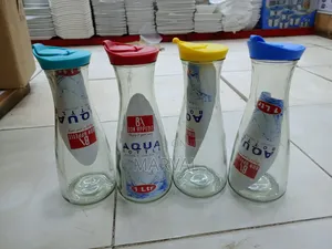 Bon Appetit Glass Water Bottle or Jug With a Yellow Plastic Lid