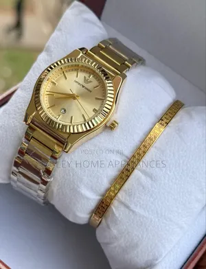 Golden Emporio Armani Classy Women Wrist Time Piece With Gold Bracelet