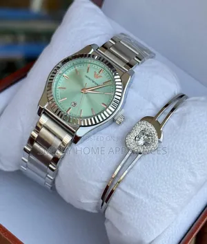 Silver Ladies Emporio Armani Wrist Time Analog Time Piece and Bracelet
