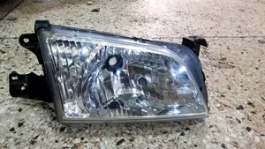 Headlamp Mazda Demio 2000