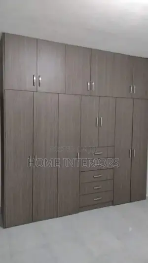 A Wardrobe With Storage Drawers