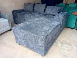A Five Seater Sofa With Pillows