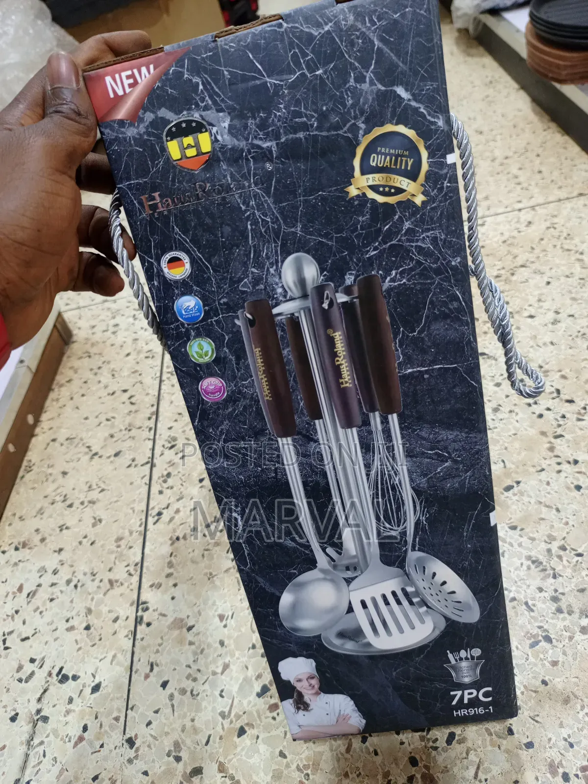 Durable Stainless Steel Kitchen Utensil Set With a Stand.