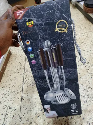 Durable Stainless Steel Kitchen Utensil Set With a Stand.