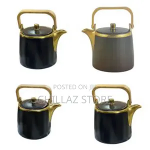 Gold Coated Teapot With Wooden Handle.