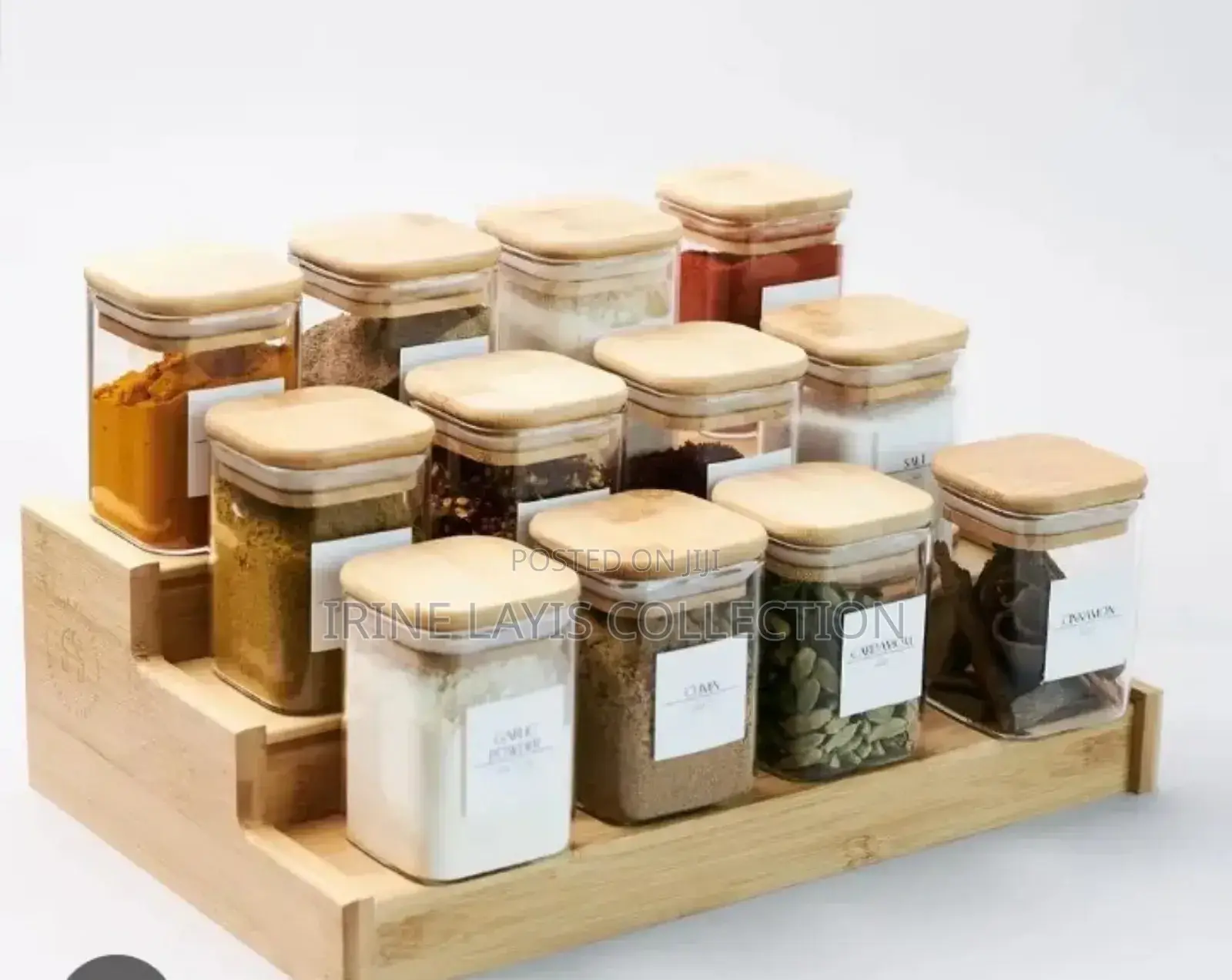 A Set of 12 Spice Jars and Stand