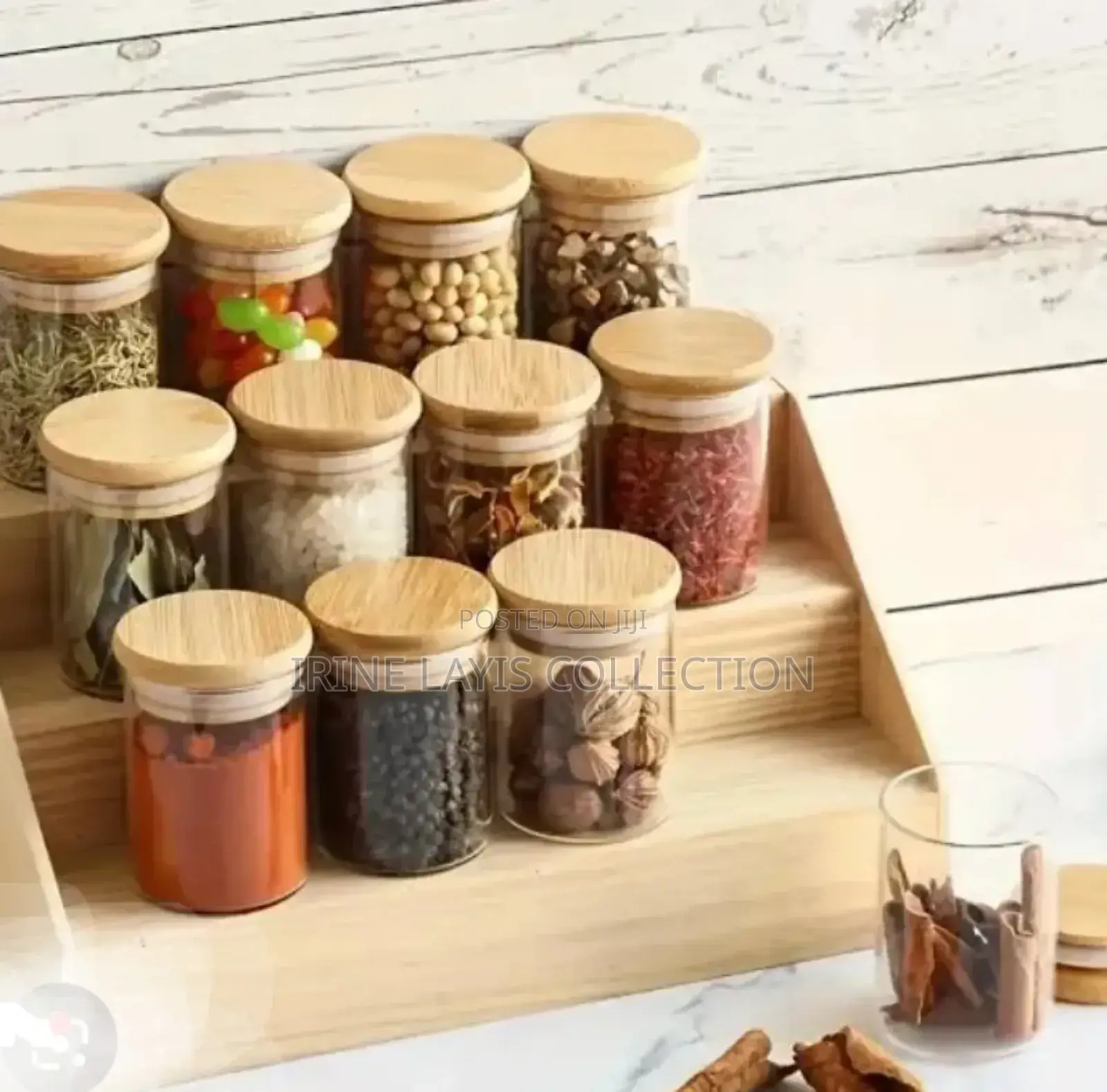 A Set of 12 Spice Jars and Stand