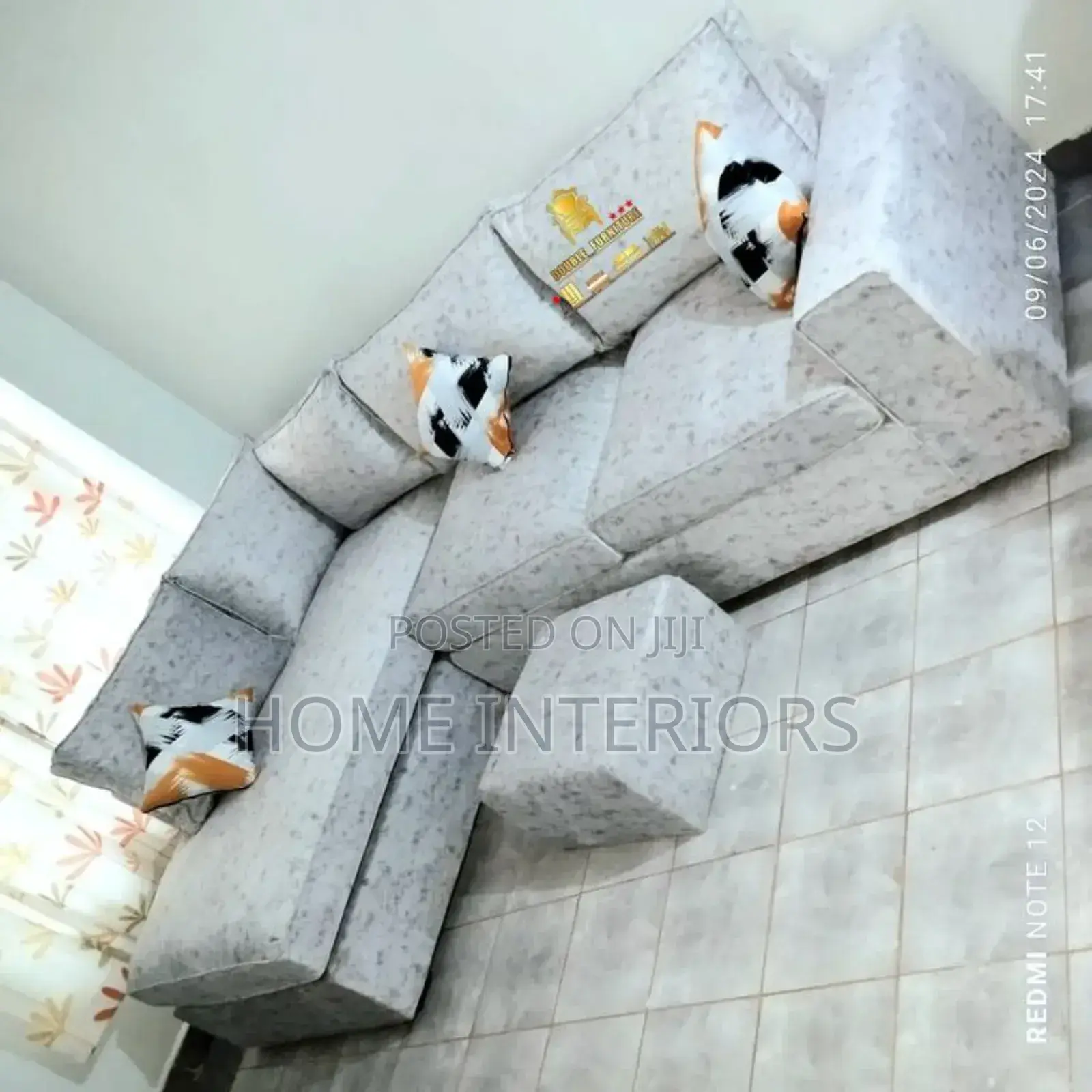 Off White Sofa With a Puff