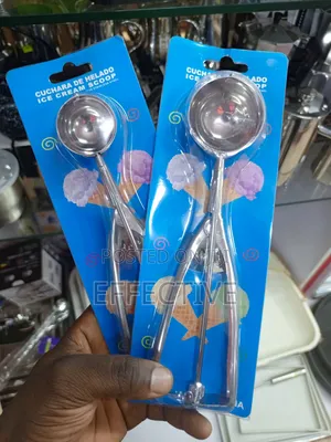 Stainless Steel Eel Ice Cream Scoop With a Trigger Release Mechanism.