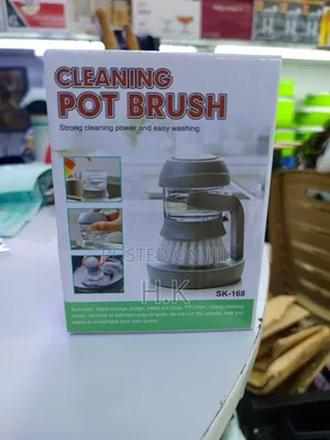 Cleaning Pot Brush With a Built-in Soap Dispenser.