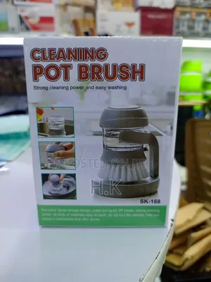 Cleaning Pot Brush With a Built-in Soap Dispenser.