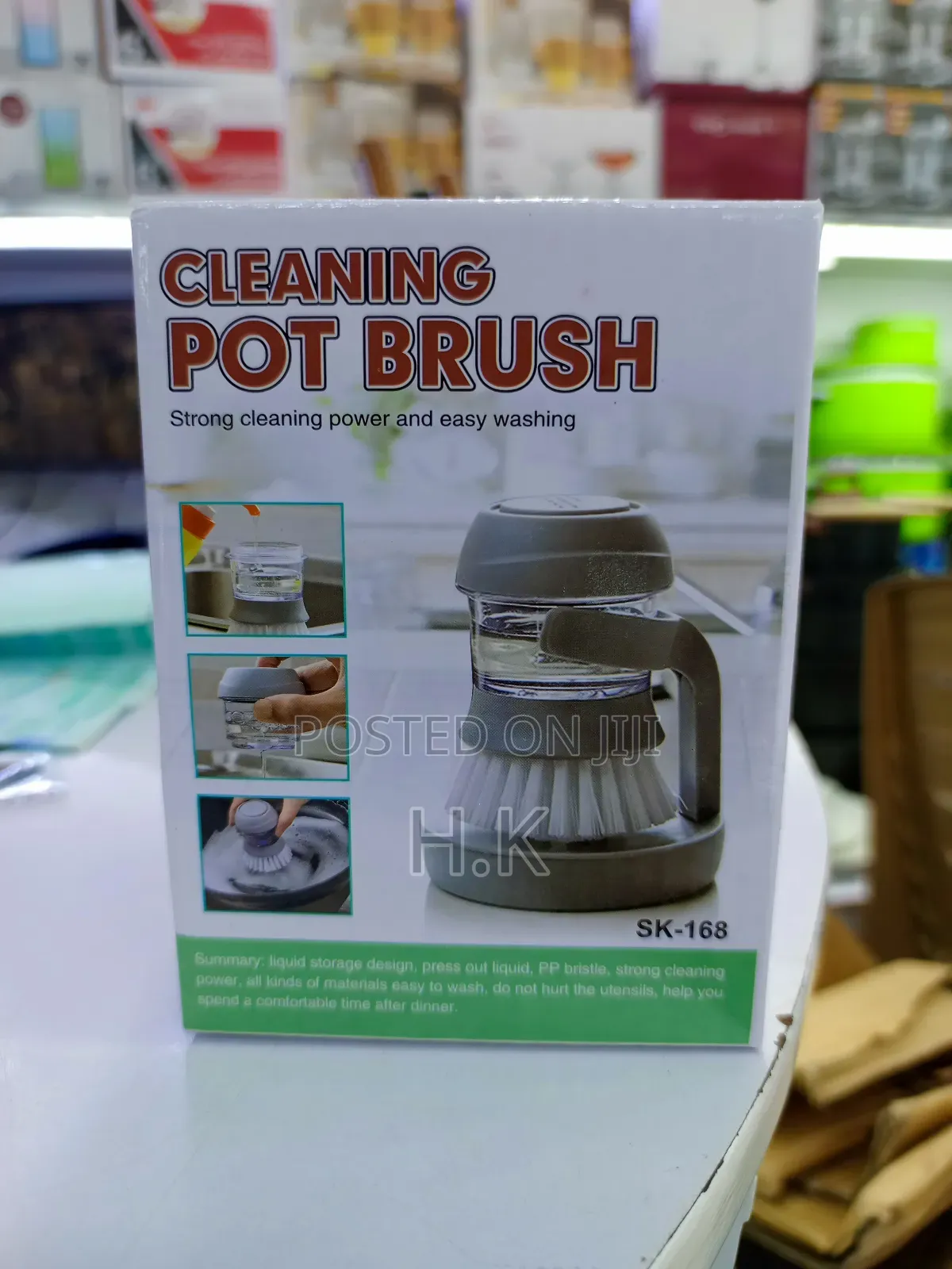 Cleaning Pot Brush With a Built-in Soap Dispenser.