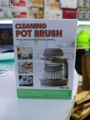 Cleaning Pot Brush With a Built-in Soap Dispenser.
