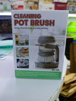 Cleaning Pot Brush With a Built-in Soap Dispenser.