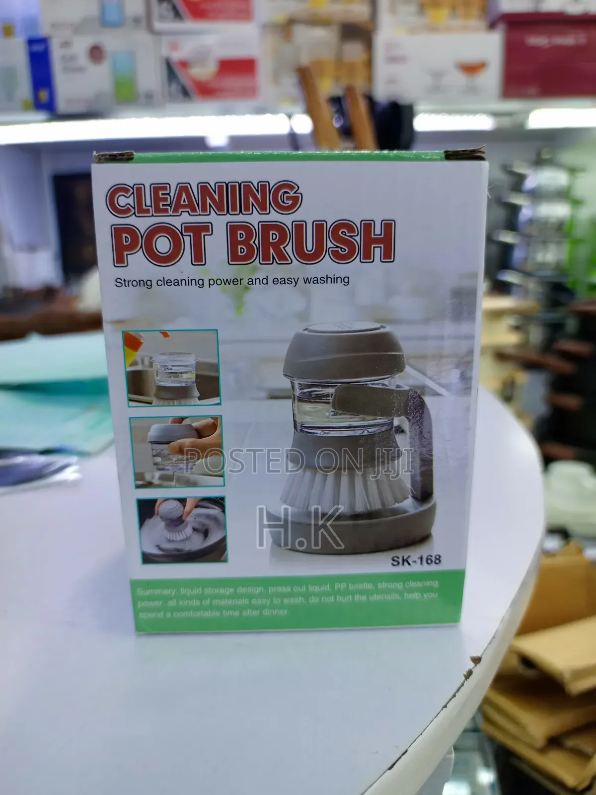 Cleaning Pot Brush With a Built-in Soap Dispenser.