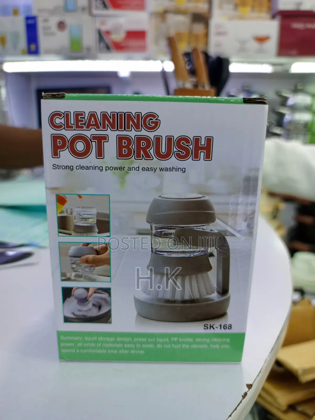 Cleaning Pot Brush With a Built-in Soap Dispenser.