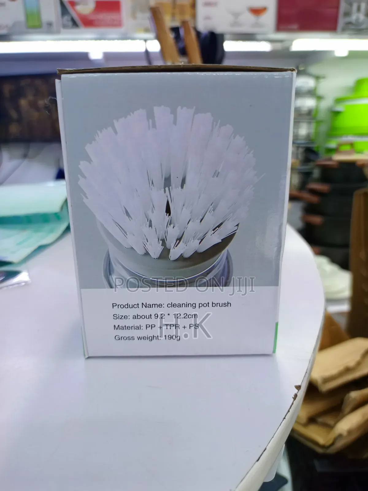 Cleaning Pot Brush With a Built-in Soap Dispenser.
