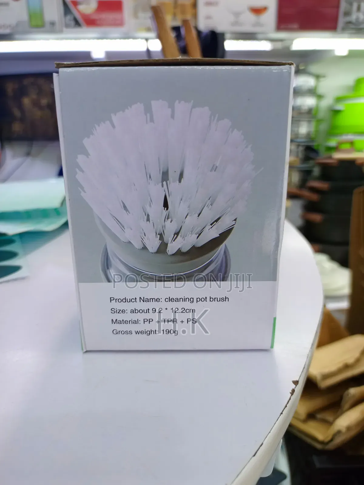 Cleaning Pot Brush With a Built-in Soap Dispenser.