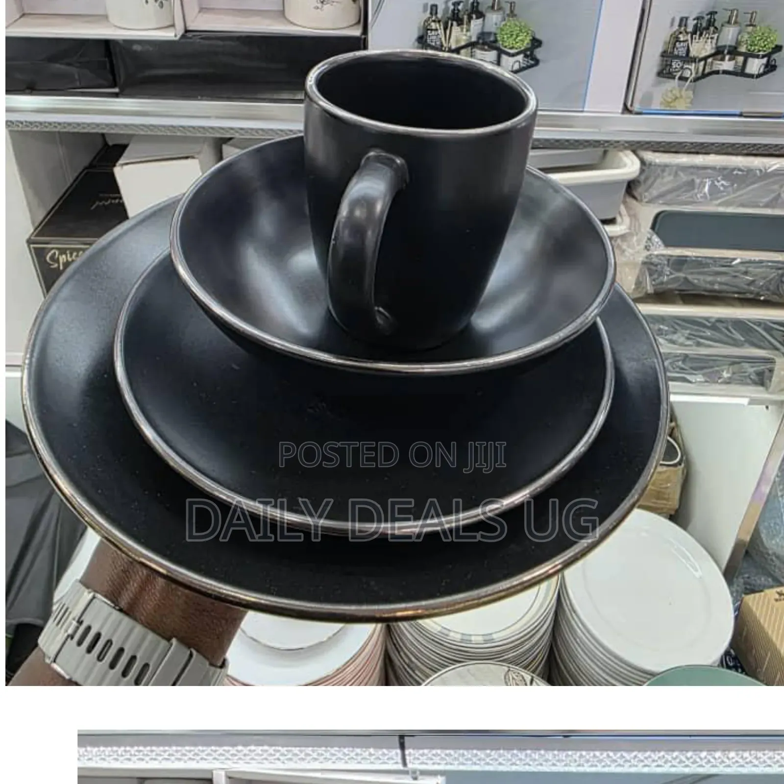 Gibson Elite Serenade 16-Piece Dinnerware Set in Matte Black.