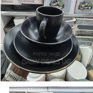 Gibson Elite Serenade 16-Piece Dinnerware Set in Matte Black.