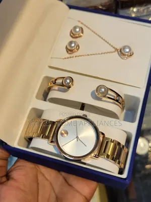 Movado Women's Golden Wrist Analog Time Piece With Bracelet