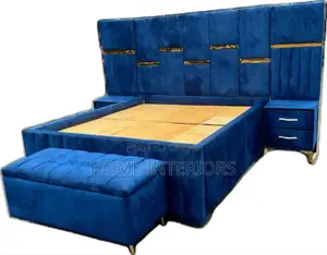 A Navy Blue Bed With a Automan