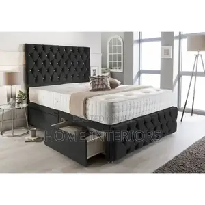 A Dark Gray  Bed With Two Storage Drawers